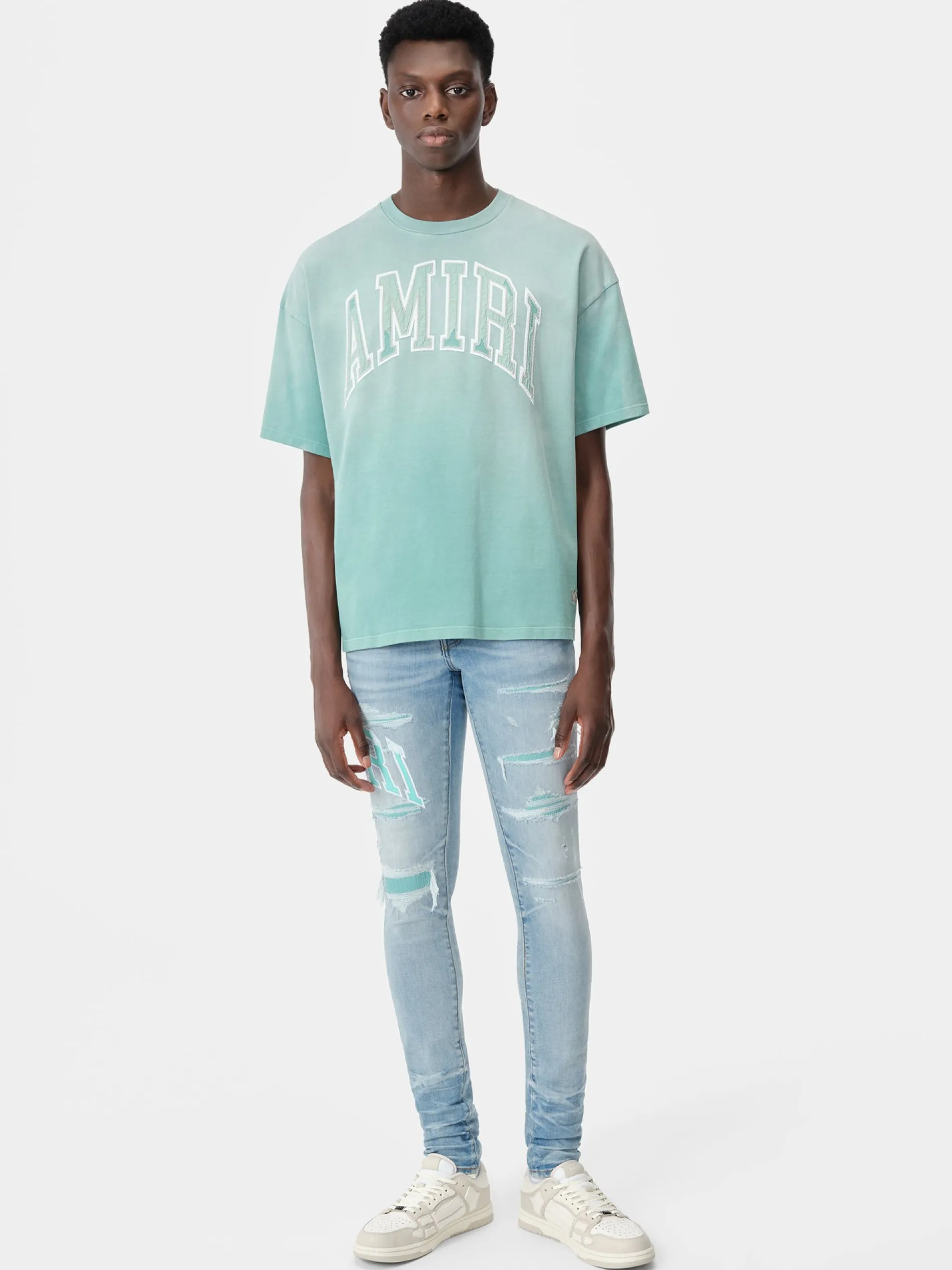 AMIRI Denim<VARSITY LOGO REPAIR JEAN PERFECT INDIGO